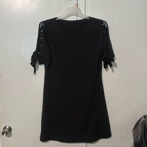 Brand new black dress never worn